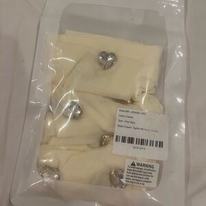 Doll Kills Sheer cream tight w/ champagne jewel hearts